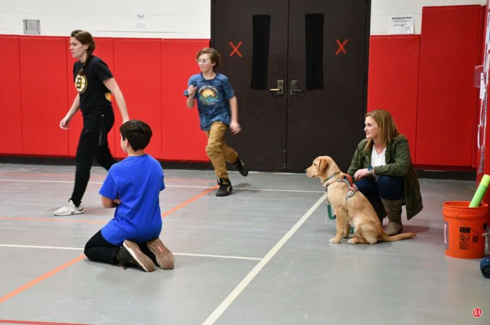 service dog in PE class with students